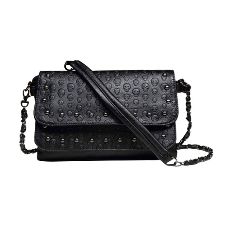 Black gothic skull emboss crossbody bag women PU rivet studs gunmetal chain strap flap closure Alternative Darkwear