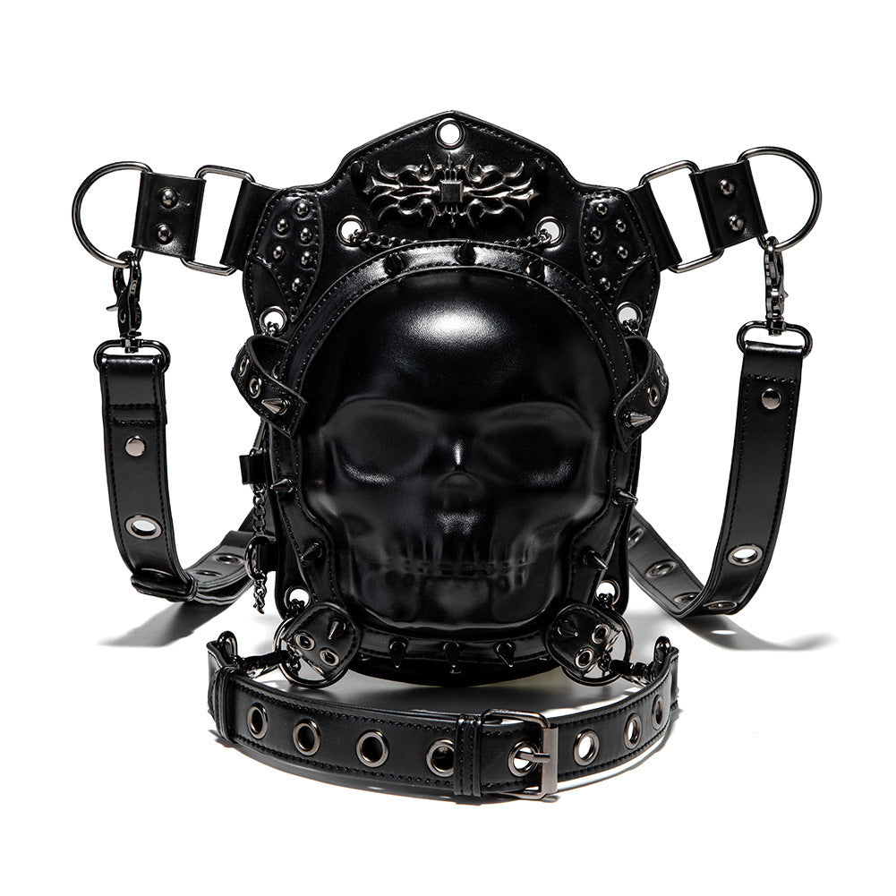Front view — full bag detail showing skull face, studs, chains, D-rings