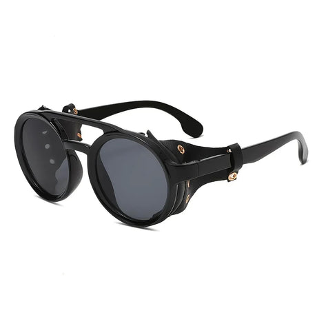 Find your signature look with sunglasses built for alternative darkwear wardrobes. From oversized shields and narrow frames to cat-eye styles and bold tinted lenses, every pair in this collection is chosen for visual impact and subcultural edge.