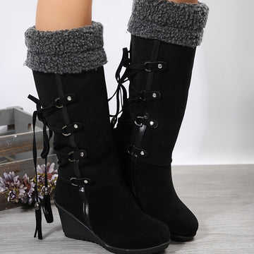 Black knee high wedge boots alternative fashion women knit cuff tassel detail front view