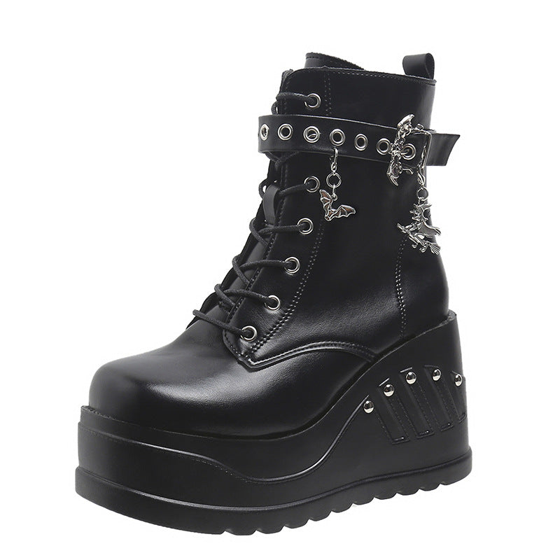 Black chain lace platform boots alternative darkwear women close up hardware and wedge heel detail