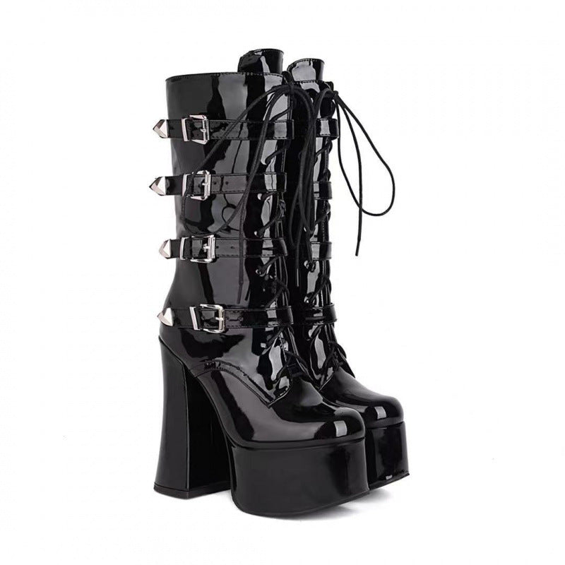 Close-up of glossy patent leather and rivet detail on women's British Martin platform boots, Alternative Darkwear