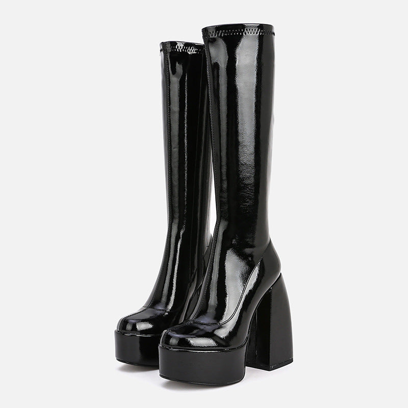Women's black glossy sheepskin above-knee fringe platform boots with chunky block heel, maximalist gothic dark fashion