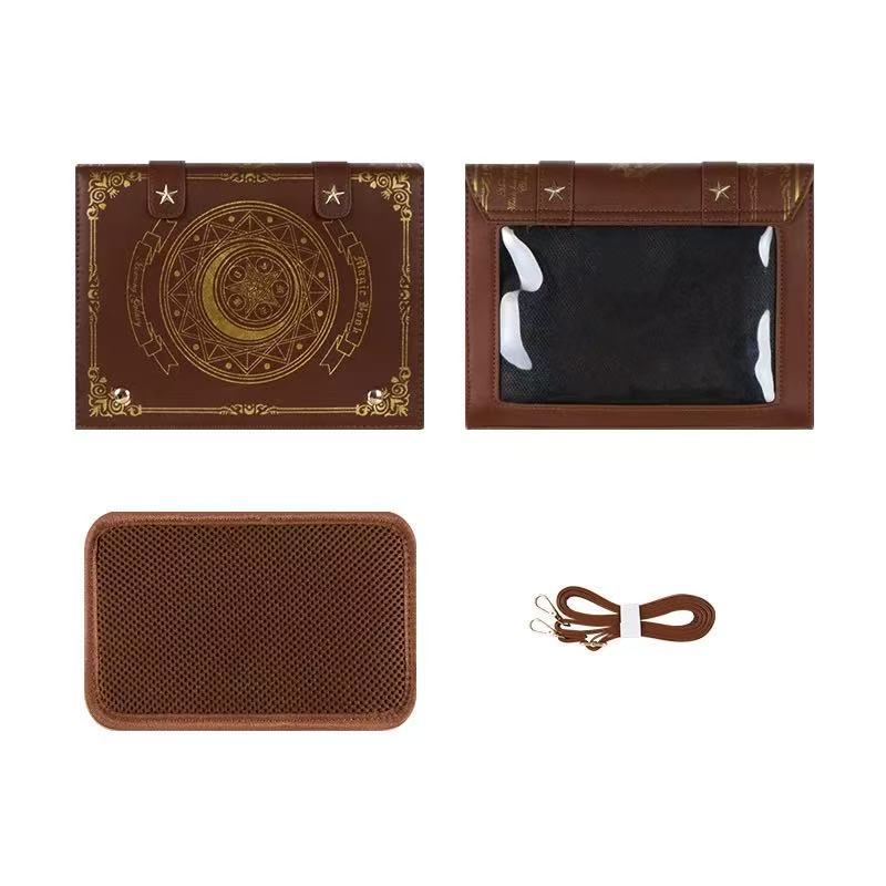 Gothic spellbook bag in brown faux leather with celestial moon embossing and gold occult detailing from Alternative Darkwear