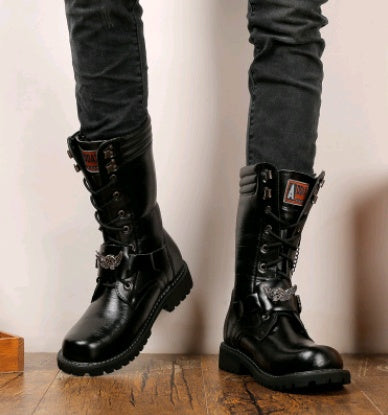 Close-up of car-stitch seam detail on men's gothic Biker boots in PU leather, wear-resistant rubber sole