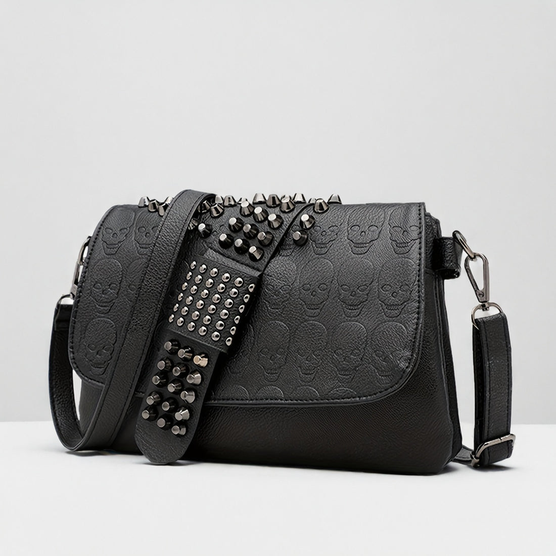 Studded skull rivet crossbody bag in black worn crossbody with adjustable strap from Alternative Darkwear