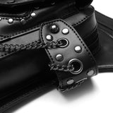 Close-up of a black leather belt waist bag with silver-tone studs, chain accents, and a buckle closure on a white background.