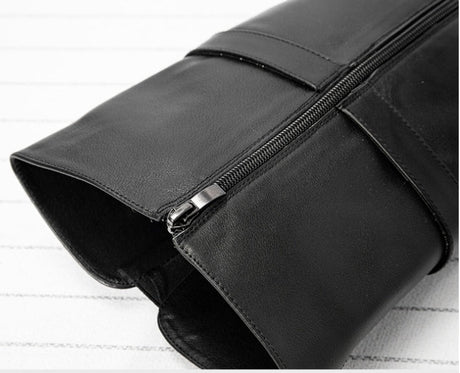 Close-up of black cowhide leather boot shaft showing inner zipper closure detail, women's darkwear OTK boots