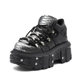 Front view of women's platform tank boots with bold chunky sole and lace-up closure, darkwear 