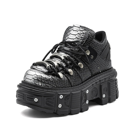 Front view of women's platform tank boots with bold chunky sole and lace-up closure, darkwear 