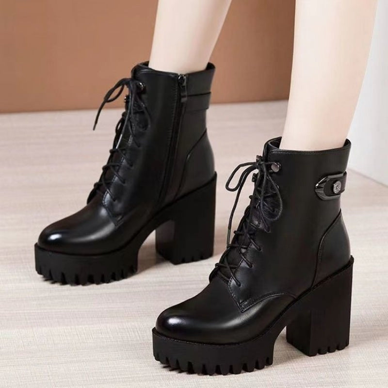 Black platform ankle boots alternative fashion women chunky square block heel and lace up front angled view