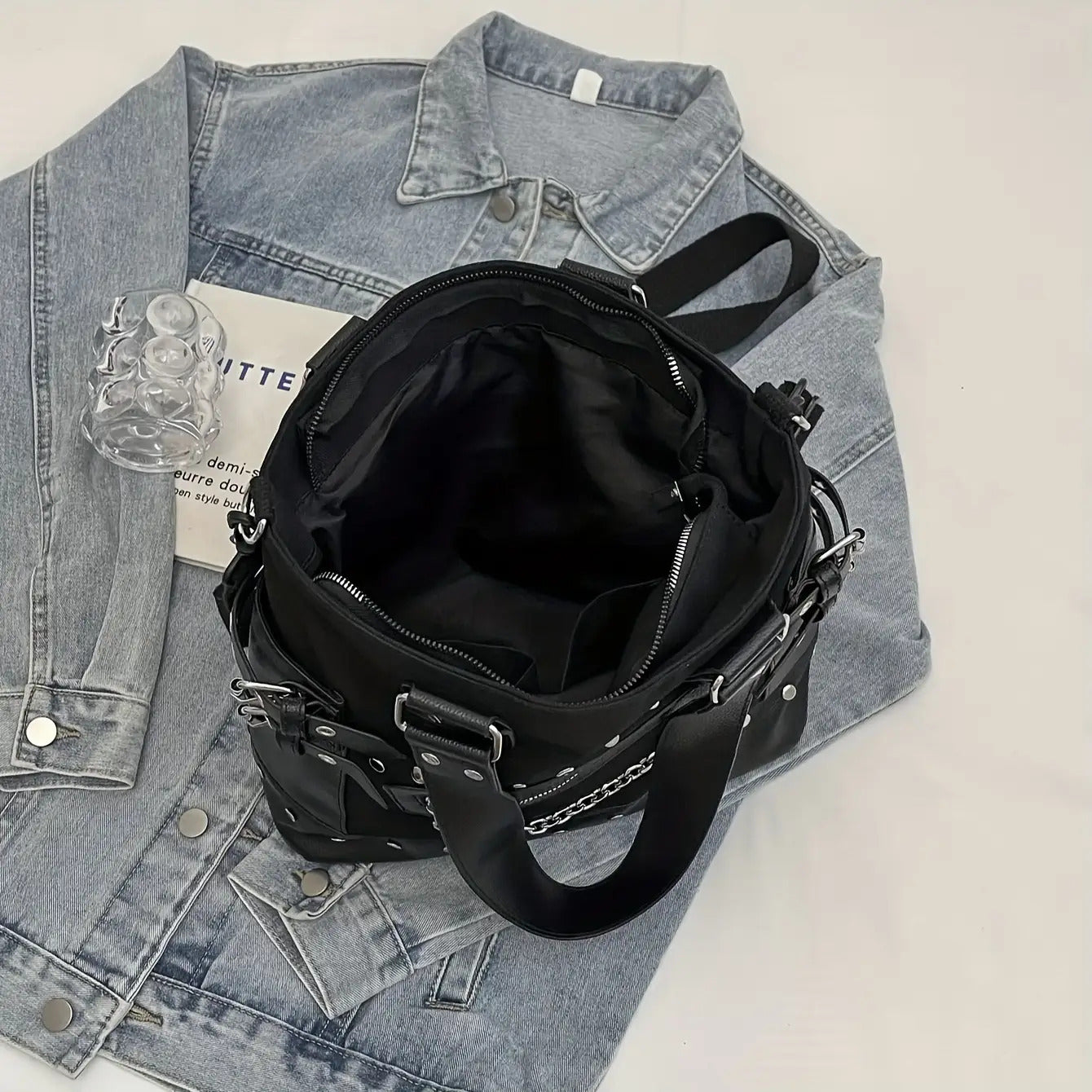Interior view of studded chain tote bag showing large capacity and zipper closure from Alternative Darkwear