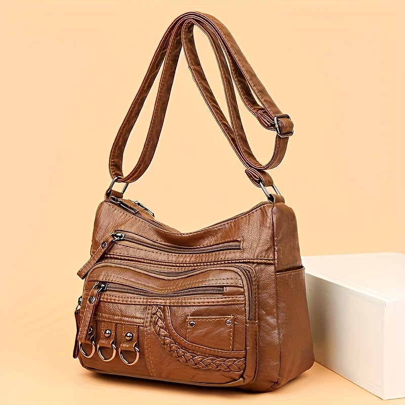 Brown: Multi-pocket quilted PU shoulder bag in brown from Alternative Darkwear
